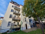 Hinteransicht - *IMMOBILIE IN TOP LAGE* – Gemütliche 2-RWG mit Laminat, Bad mit Wanne, Balkon **WE01**