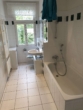 Referenzbild Bad - **Helle 2-RWG** MIT TAGESLICHTBAD & WANNE **WE 09**