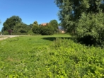 Ansicht vom Teich zur Kirche